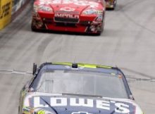 Jimmie Johnson pulls away from Tony Stewart and Kurt Busch to win his first career race at Bristol Motor Speedway. Credit: Doug Pensinger/Getty Images for NASCAR